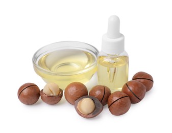 Photo of Delicious organic Macadamia nuts and natural oil isolated on white