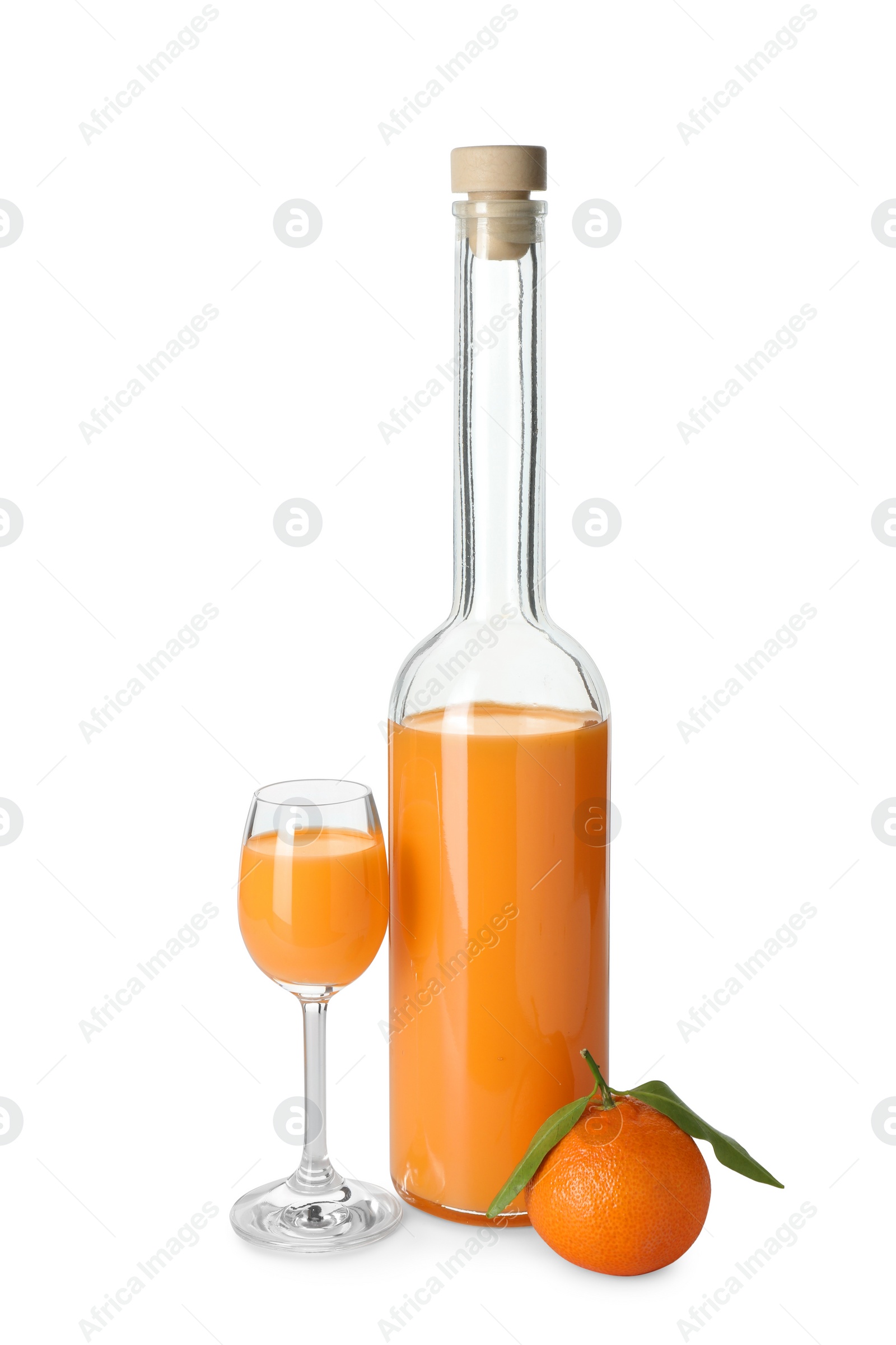 Photo of Tasty tangerine liqueur and fresh fruit isolated on white