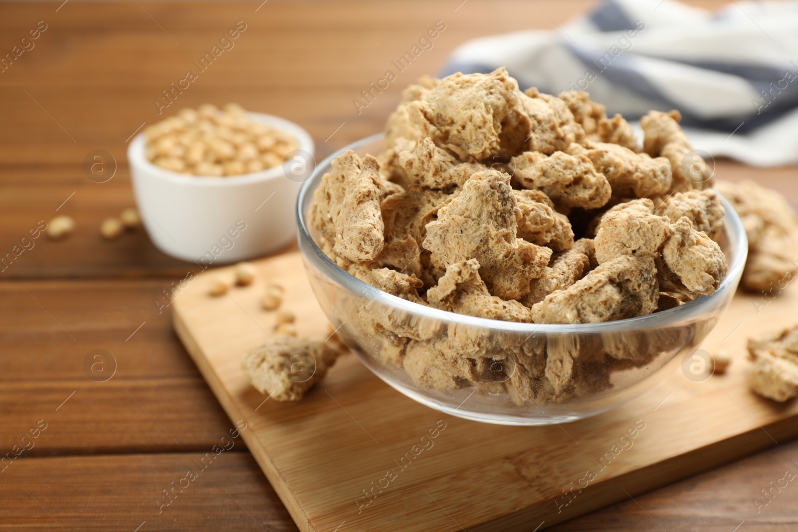 Photo of Dehydrated soy meat chunks on wooden table