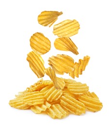 Image of Ridged crispy potato chips falling into heap on white background