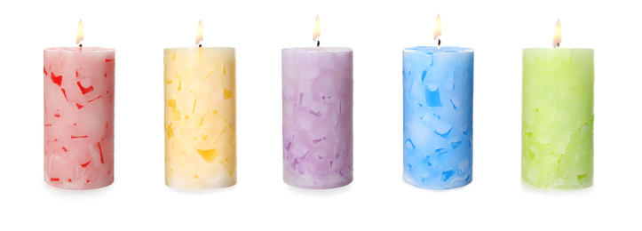 Set of burning color candles on white background. Banner design