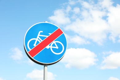 Photo of Traffic sign End Of Cycleway against blue sky, space for text
