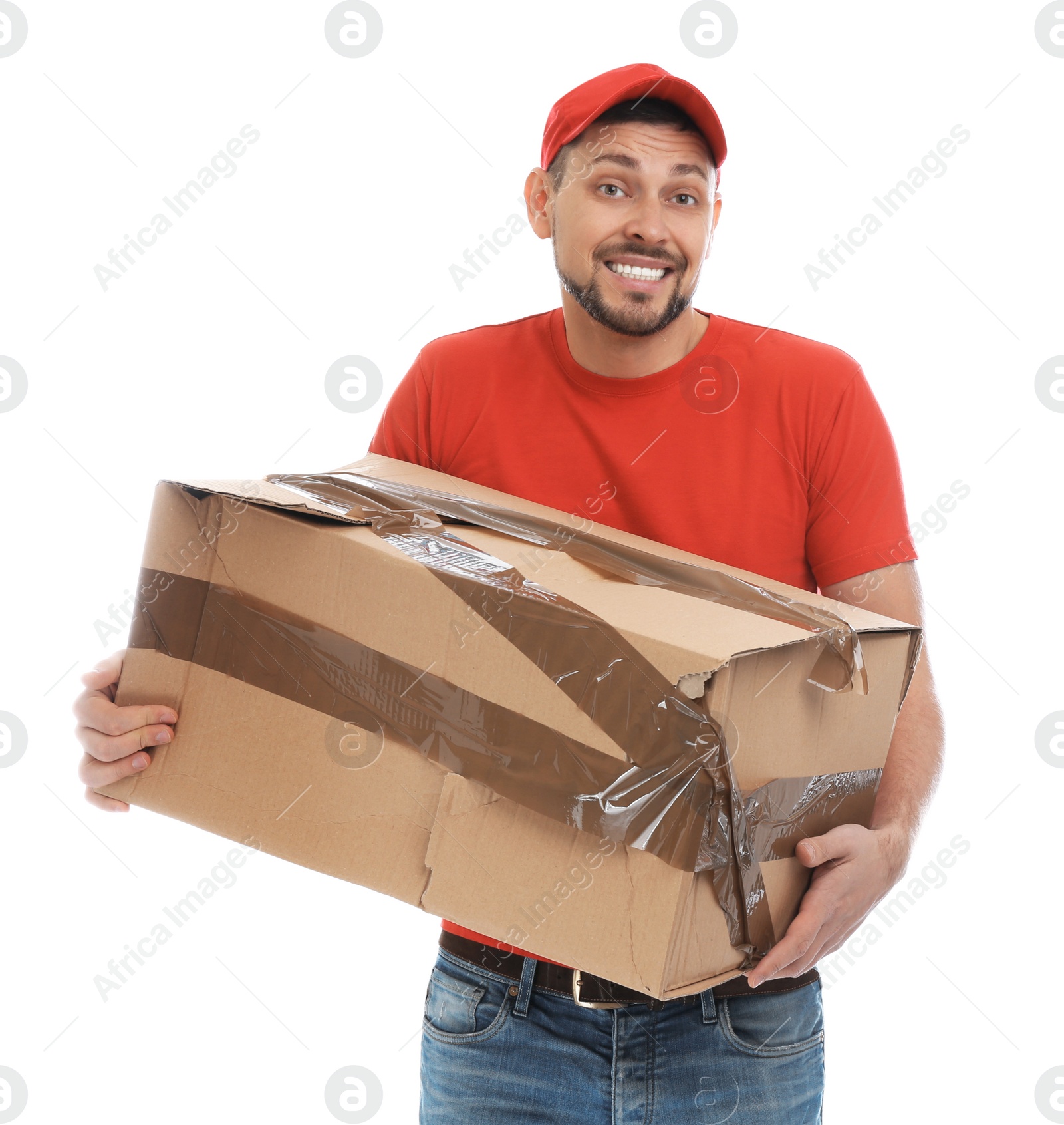 Photo of Emotional courier with damaged cardboard box on white background. Poor quality delivery service