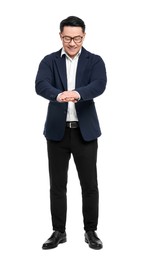 Businessman in suit posing on white background