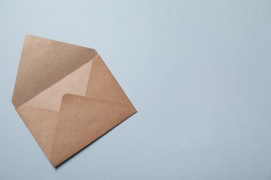 Letter envelope on grey background, top view. Space for text