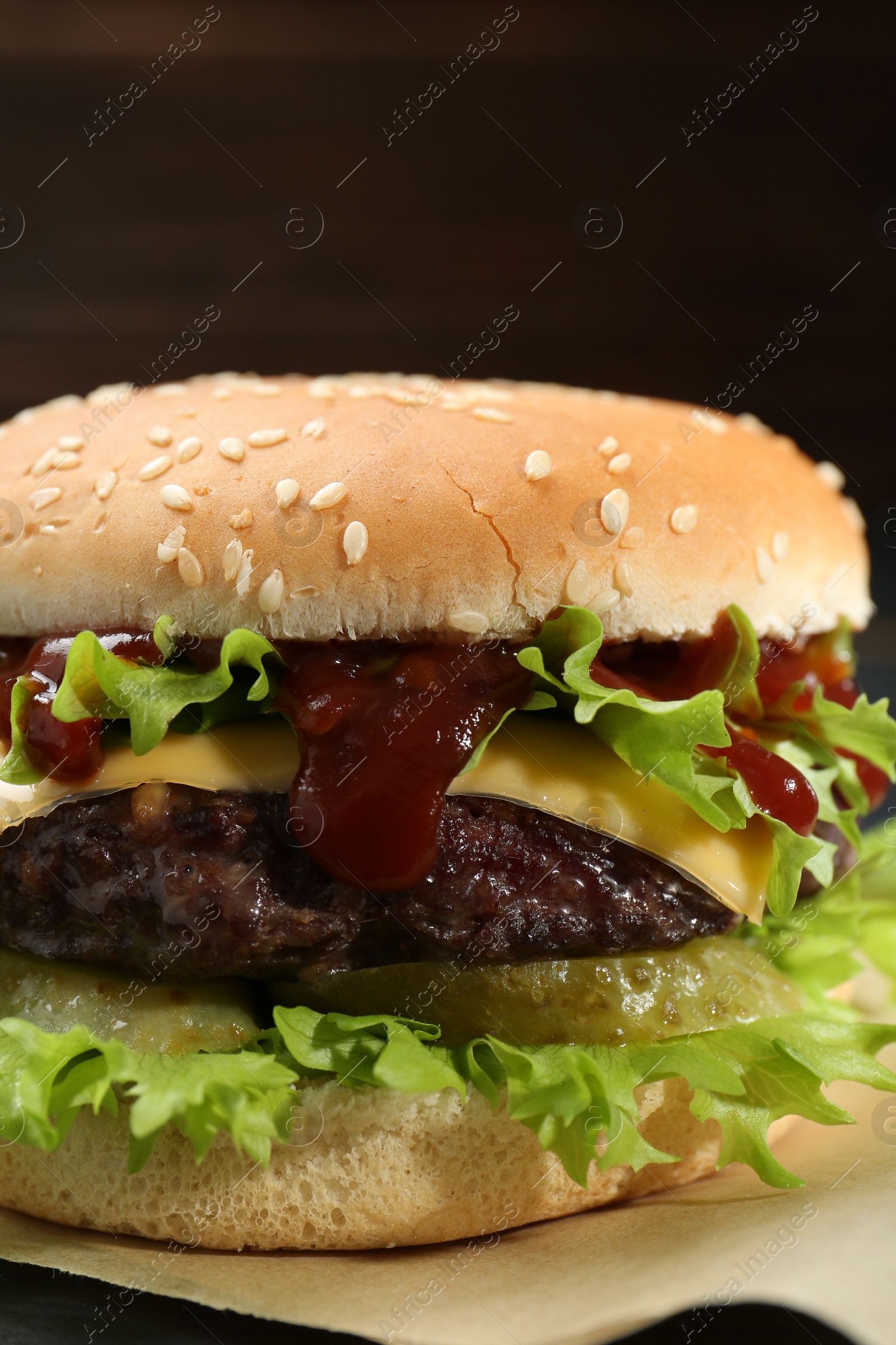 Photo of Burger with delicious patty on table, closeup