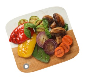 Different delicious grilled vegetables on white background, top view