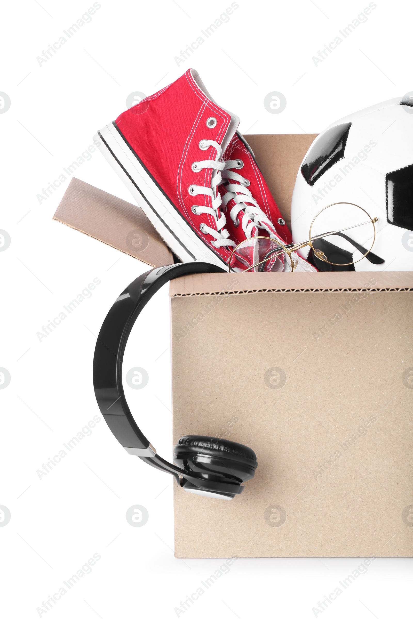 Photo of Box with unwanted stuff isolated on white