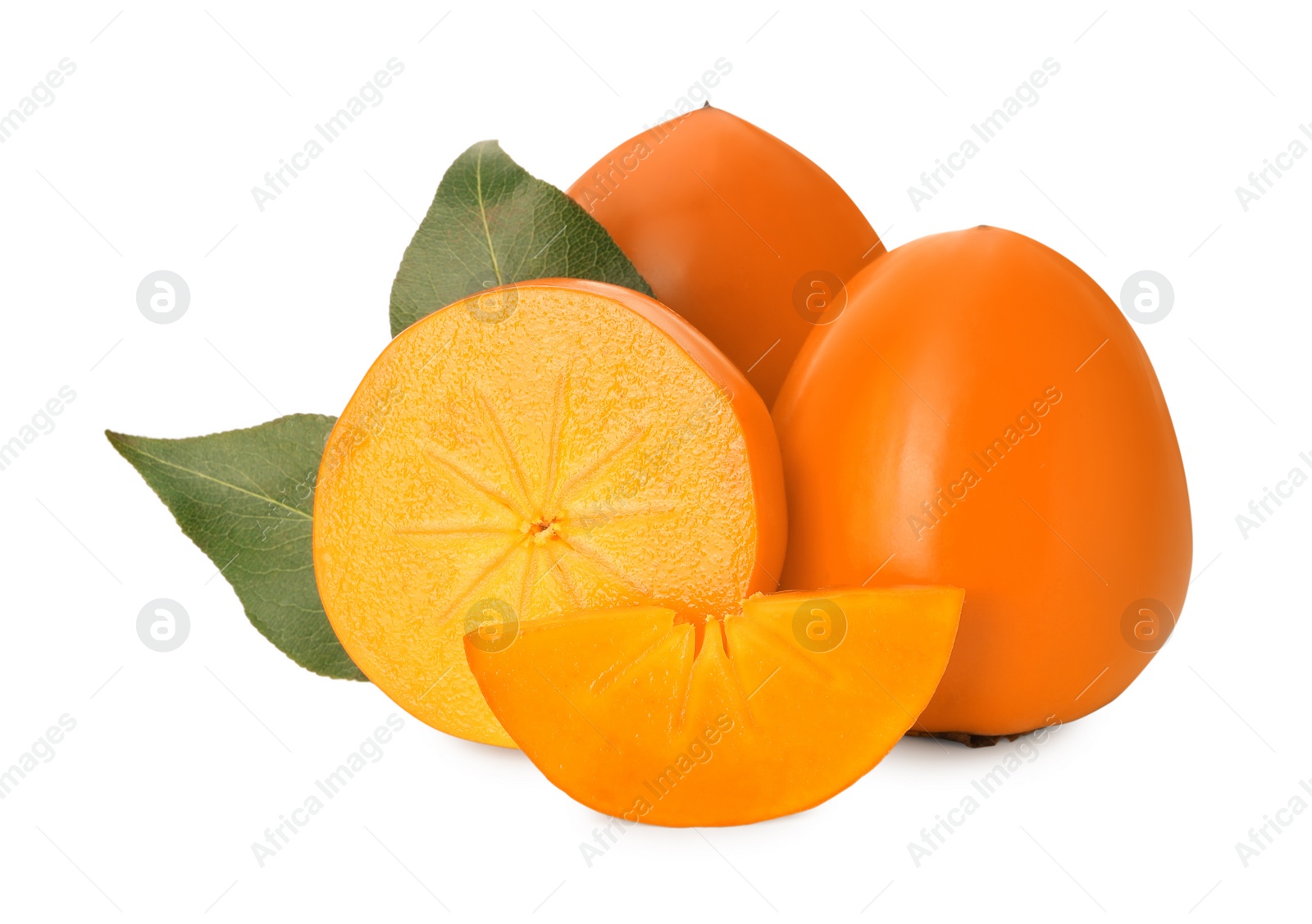 Photo of Whole and cut delicious ripe juicy persimmons on white background