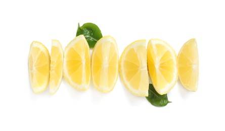 Fresh ripe lemon slices with leaves on white background, top view