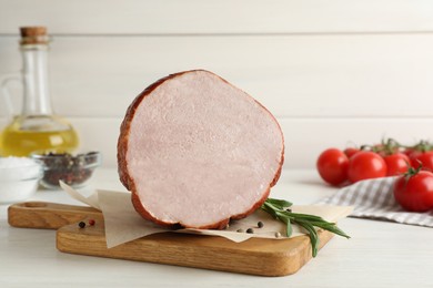 Photo of Delicious fresh ham on white wooden table