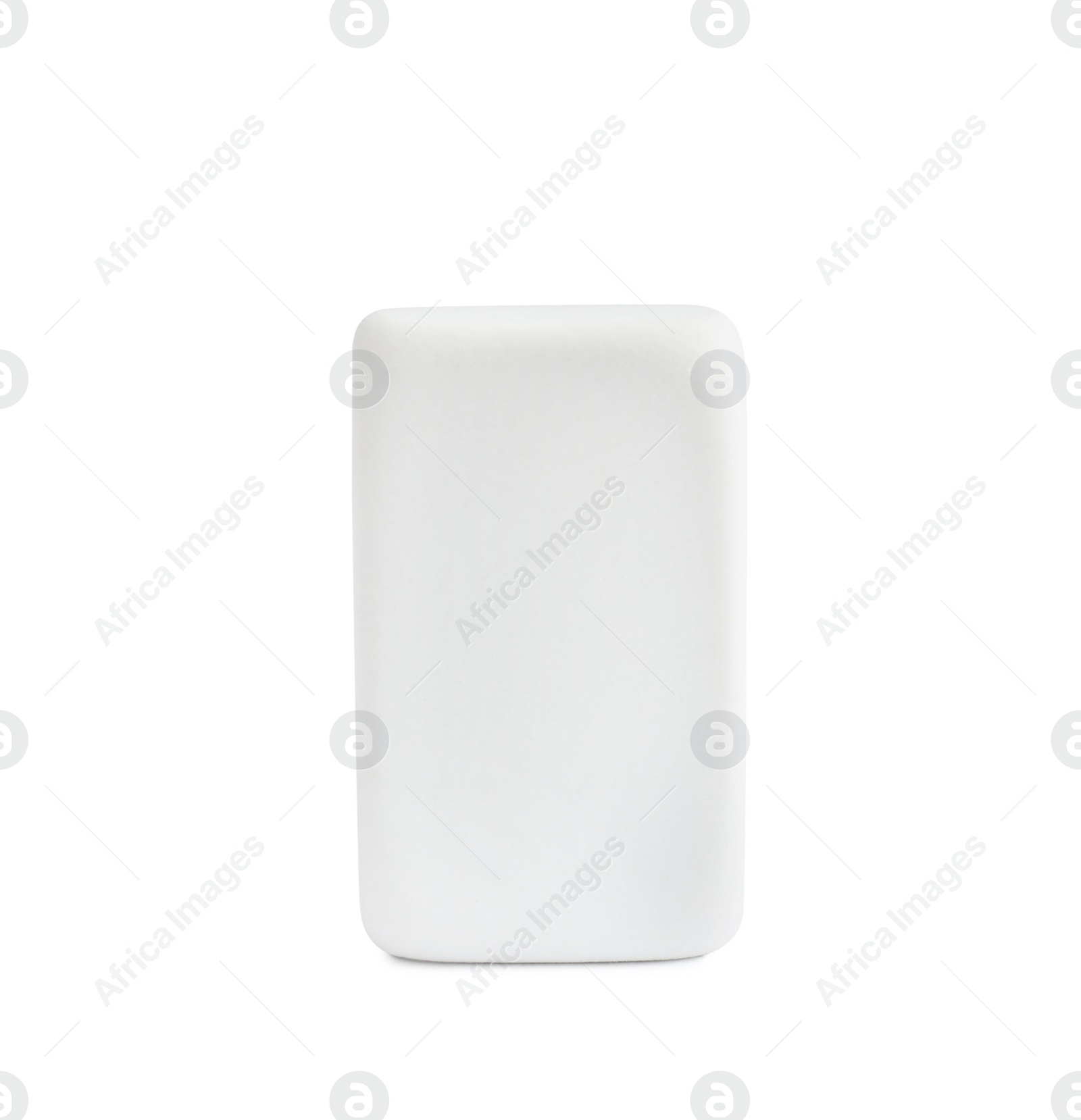 Photo of New eraser isolated on white. School stationery