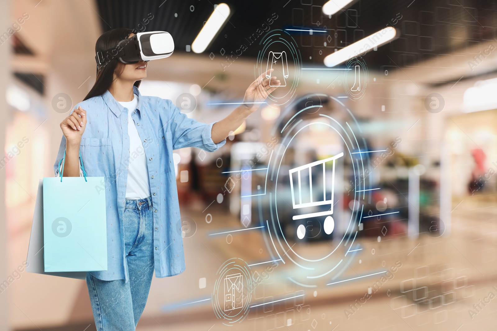 Image of Young woman with shopping bags using virtual reality headset in simulated store