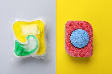 Photo of Dishwasher detergent pod and tablet on color background, flat lay