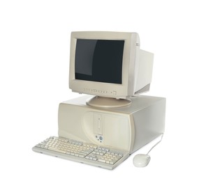 Photo of Old computer monitor, keyboard, system unit and mouse on white background