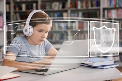 Image of Child safety online. Little boy using laptop indoors. Illustration of internet blocking app on foreground