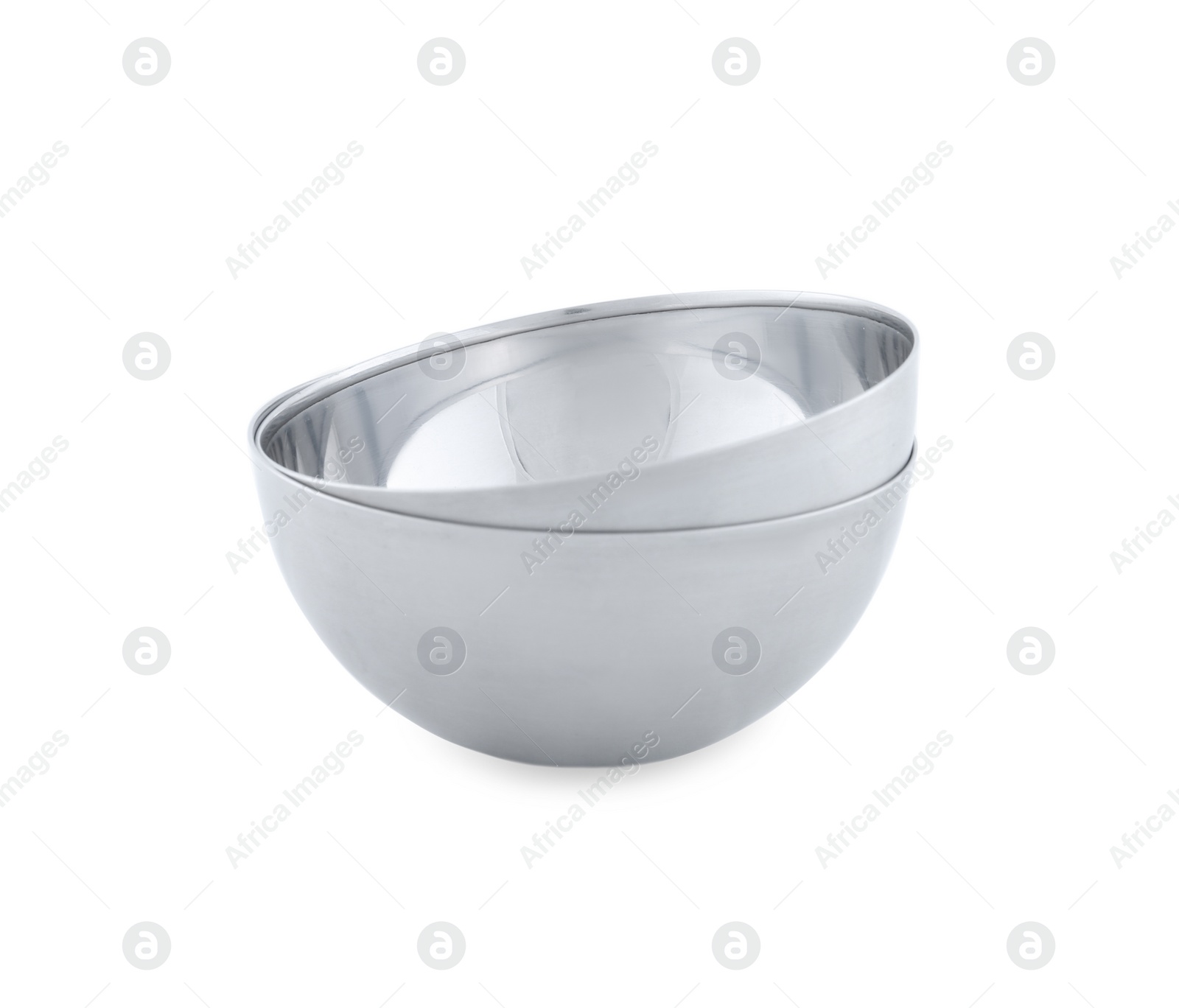 Photo of Empty clean metal bowls isolated on white