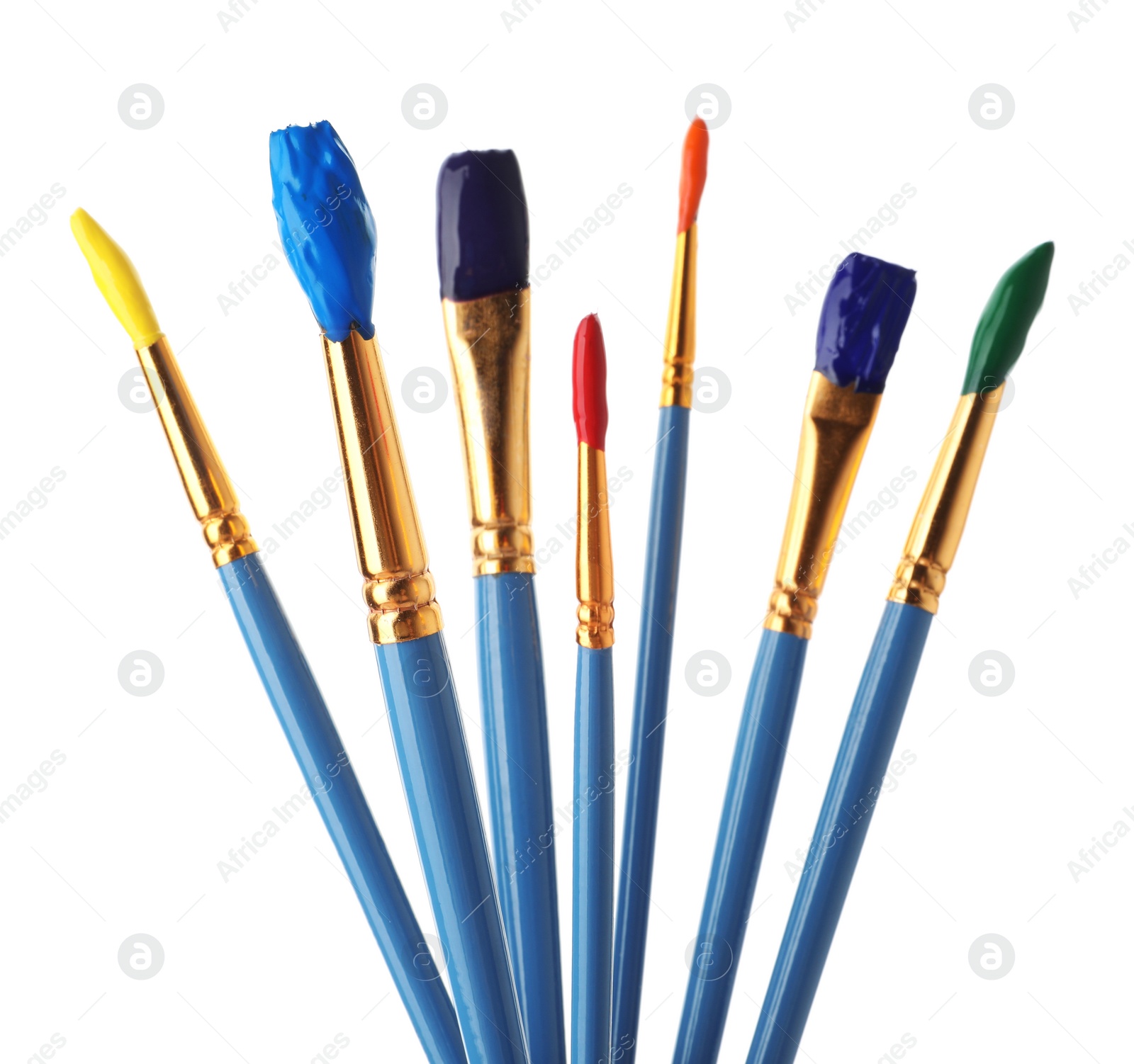 Photo of Different brushes with paints on white background