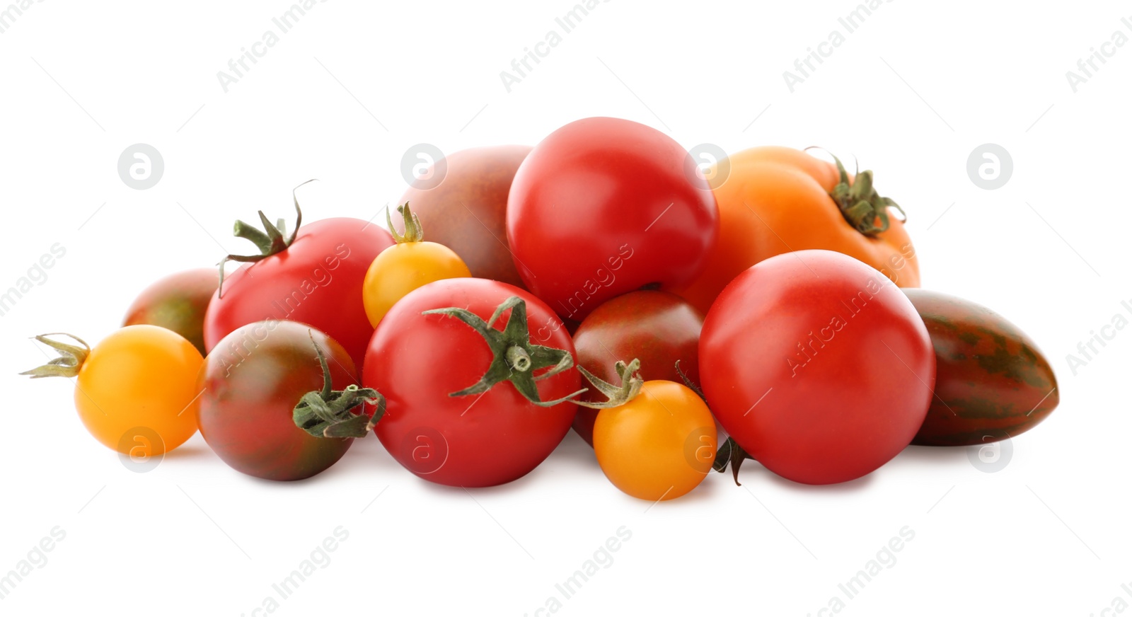 Photo of Heap of fresh ripe red and yellow tomatoes on white background