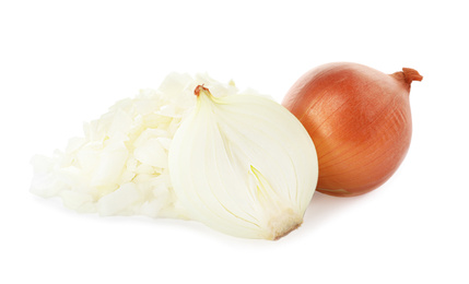 Whole and cut onion bulbs on white background