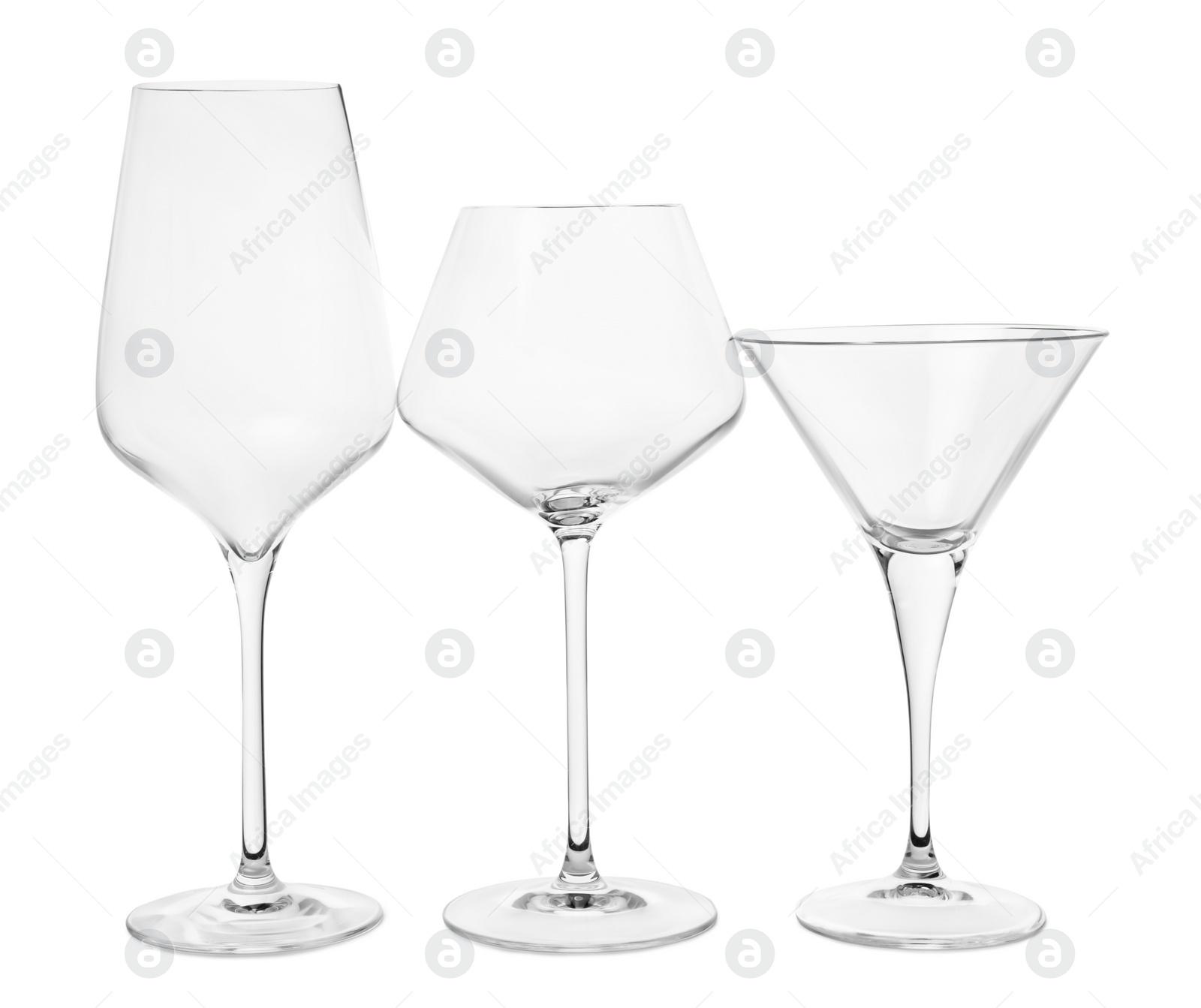 Photo of Elegant empty wine and martini glasses isolated on white