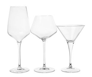 Photo of Elegant empty wine and martini glasses isolated on white