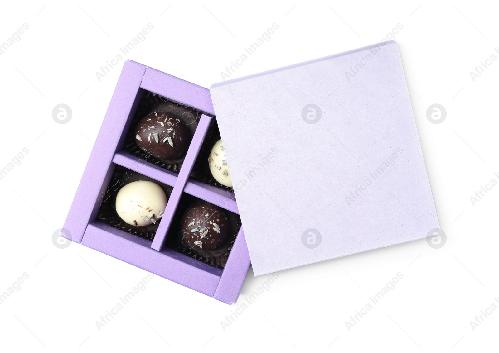 Photo of Box with tasty chocolate candies isolated on white, top view