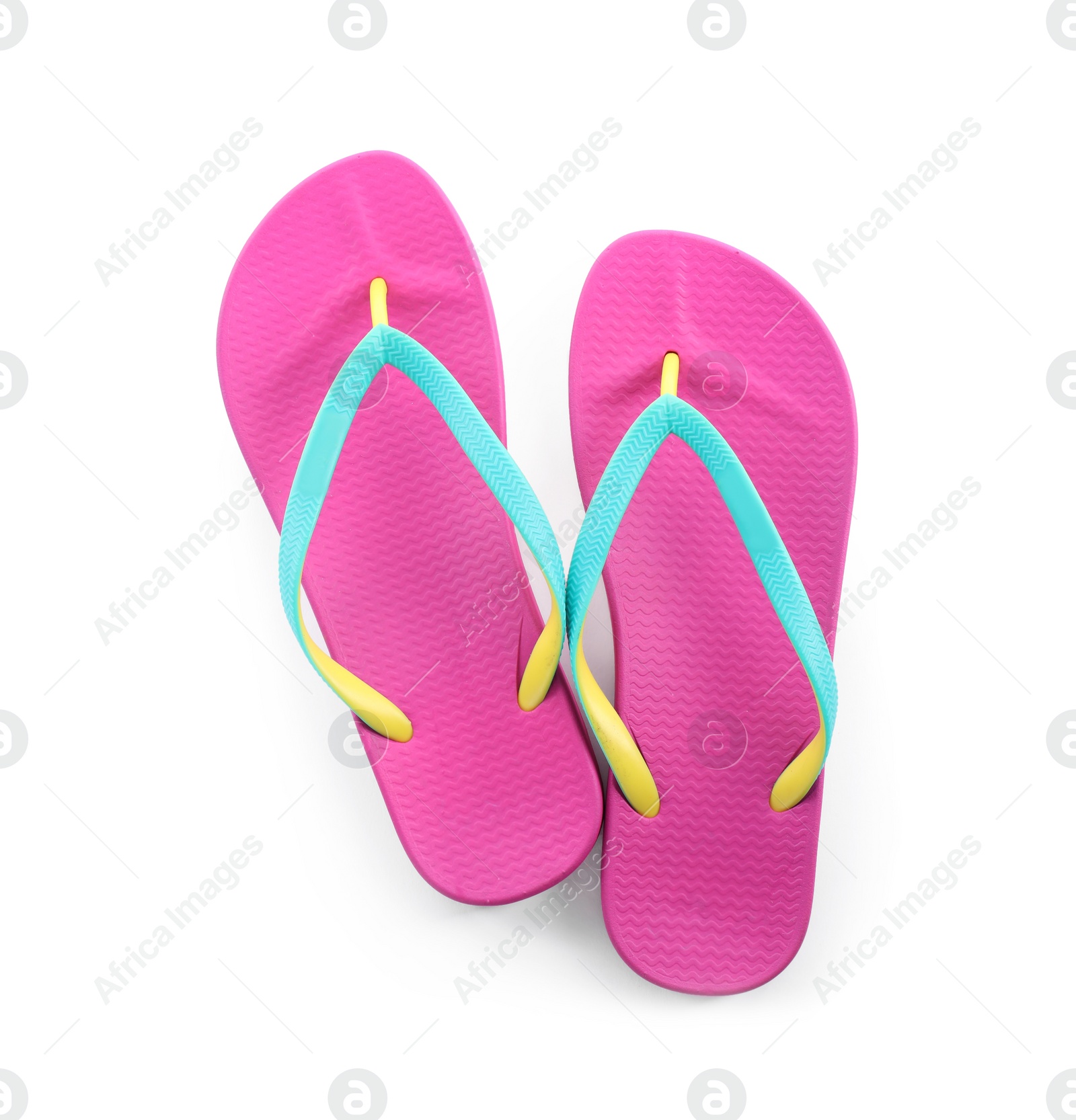 Photo of Pair of stylish pink flip flops isolated on white, top view. Beach object