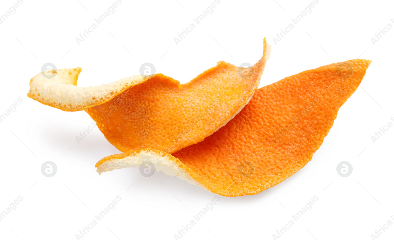 Photo of Dry orange fruit peels on white background