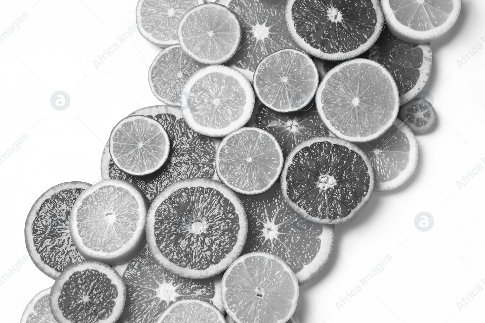 Image of Fresh juicy citrus fruits on light background, flat lay. Black and white tone 