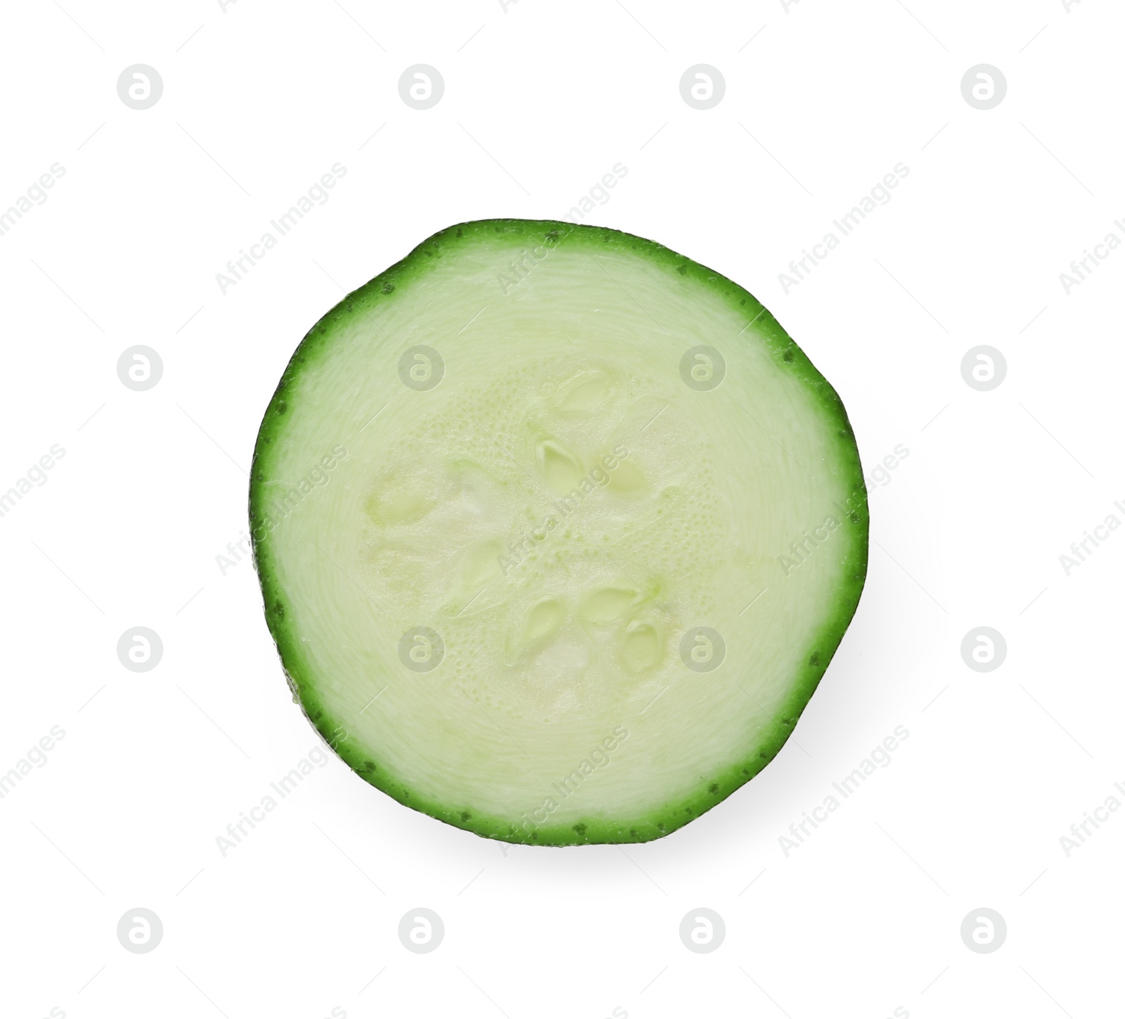 Photo of Slice of ripe zucchini isolated on white, top view