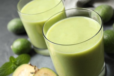 Photo of Fresh feijoa smoothie in glass, closeup view