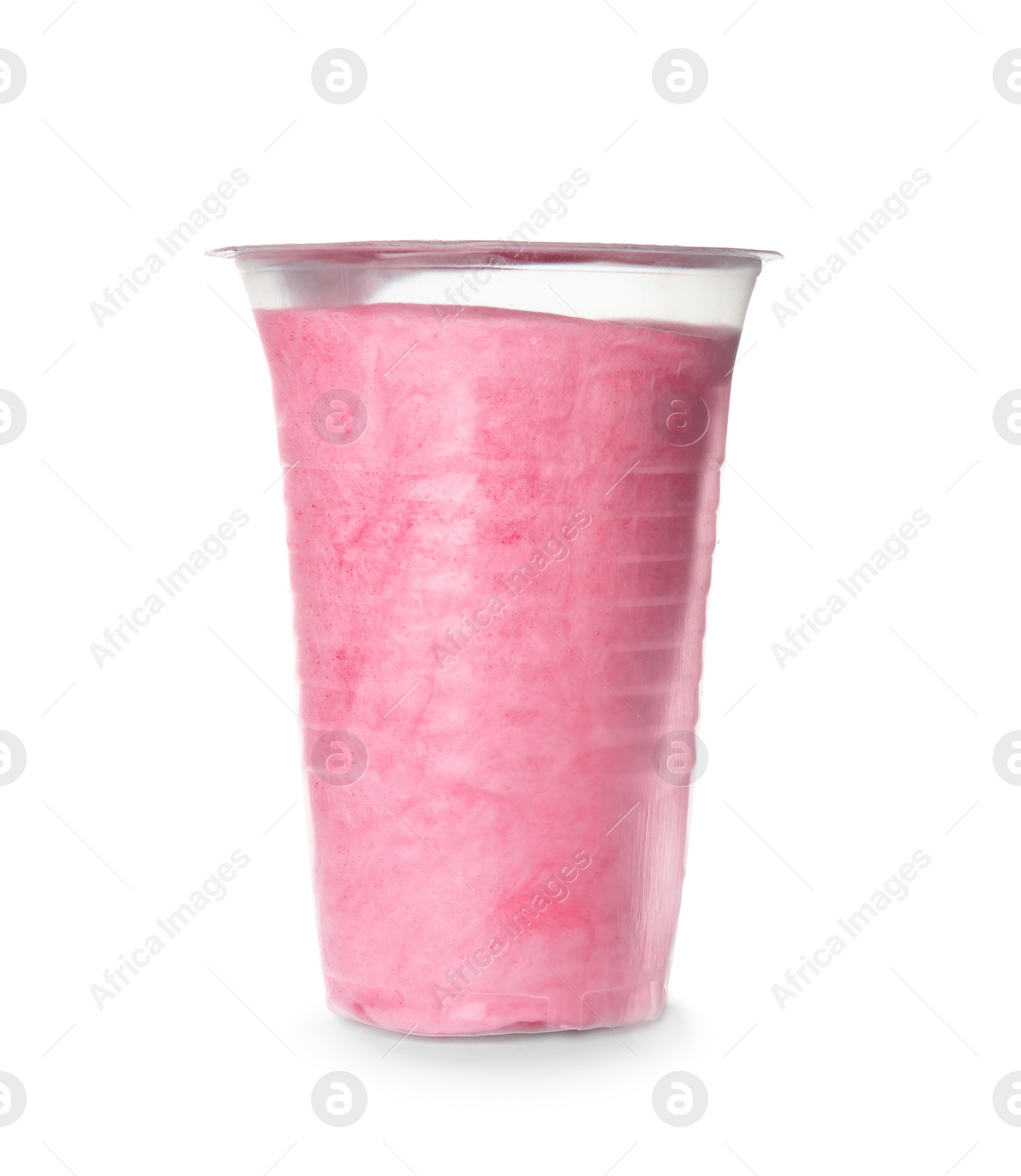 Photo of Yummy cotton candy in plastic cup on white background
