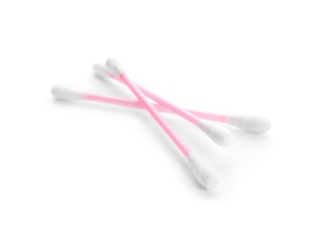 Photo of Pink plastic cotton swabs on white background