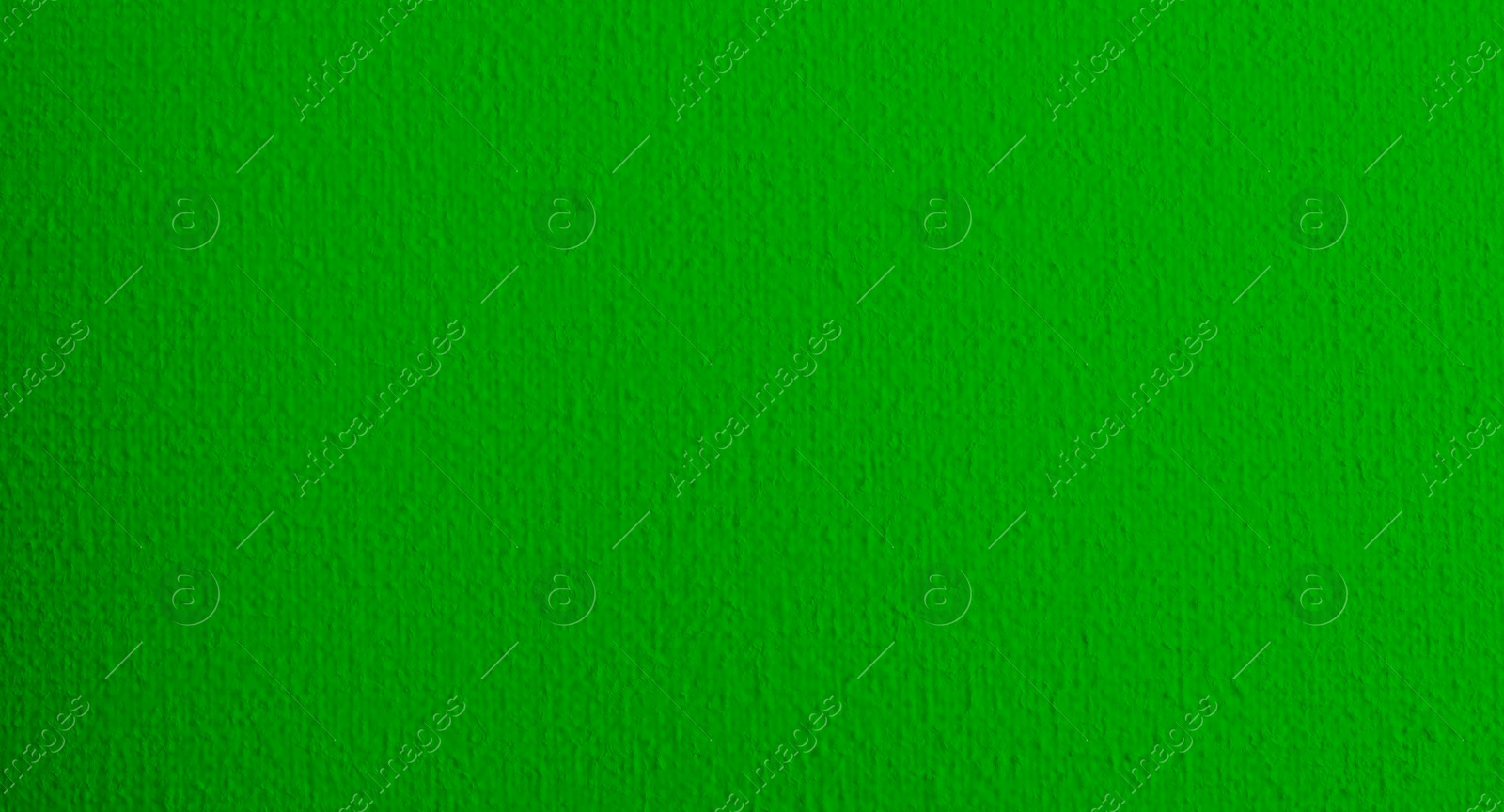 Image of Textured bright green background. Chroma key compositing