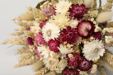 Photo of Beautiful bouquet of dry flowers on white background, closeup