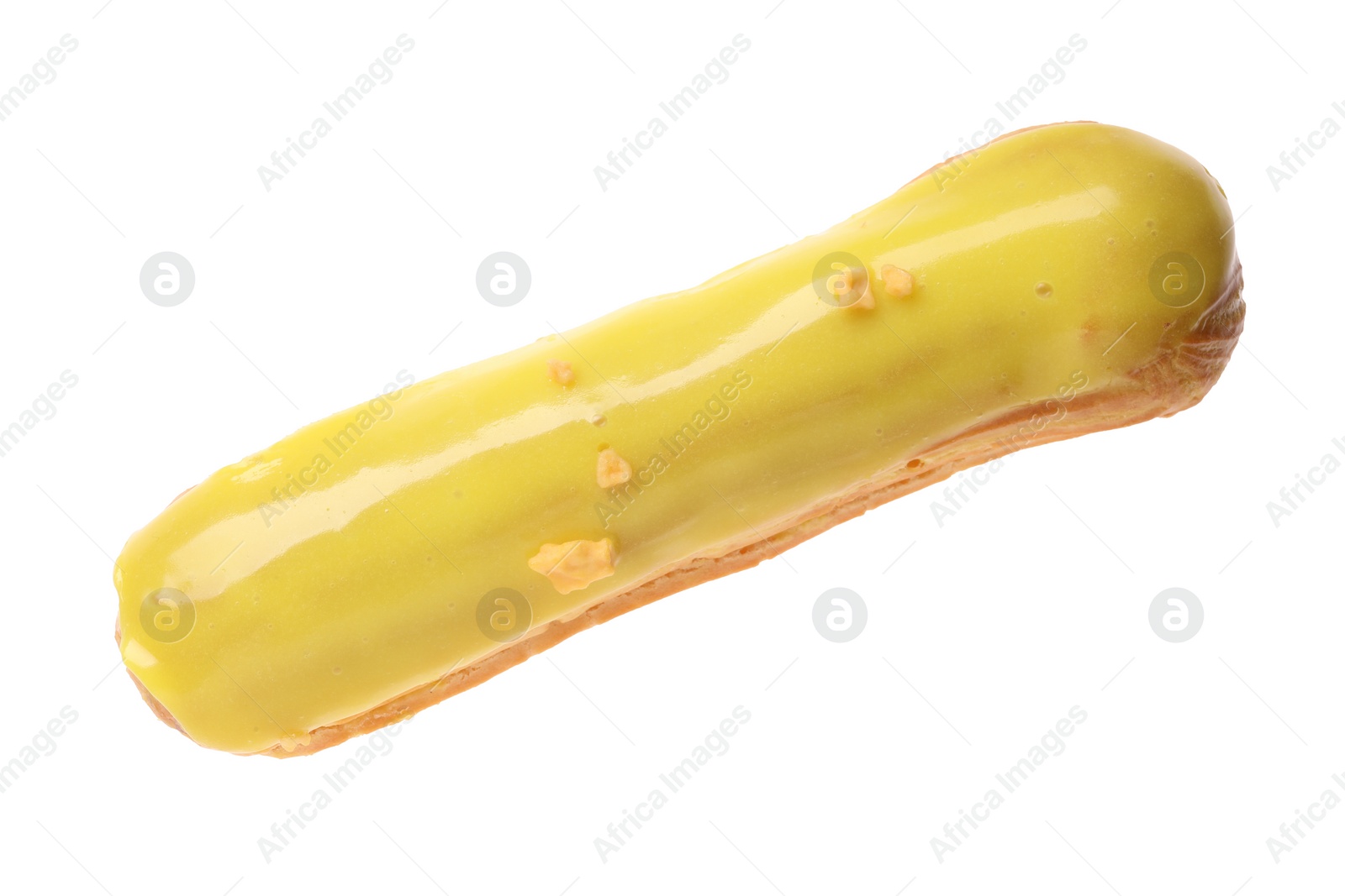 Photo of Delicious eclair covered with yellow glaze isolated on white