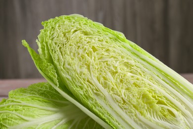 Fresh ripe Chinese cabbages against blurred background, closeup