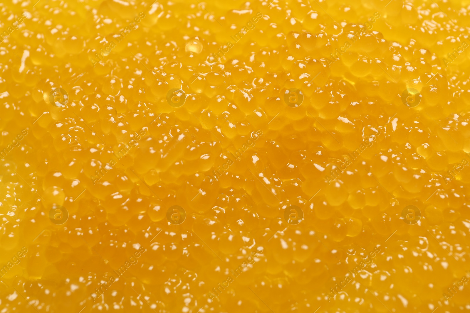 Photo of Fresh pike caviar as background, closeup view