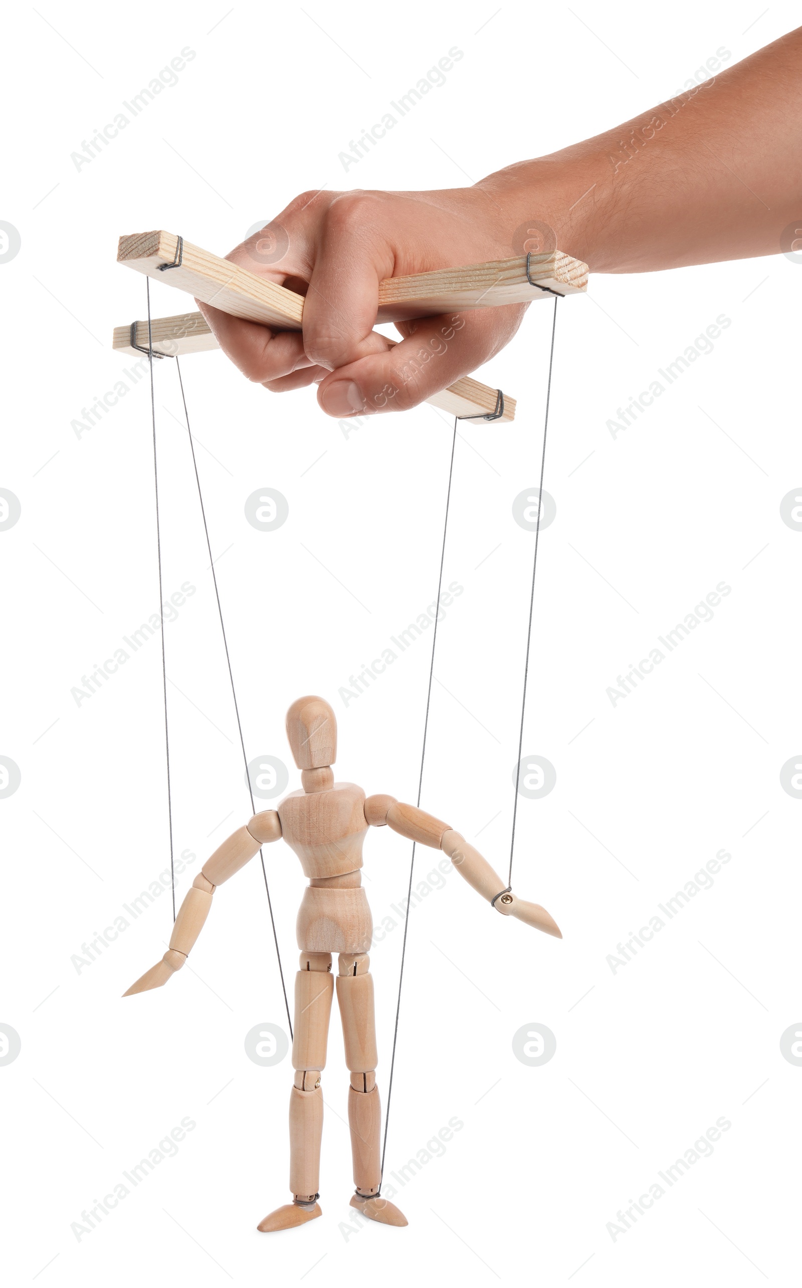 Photo of Man pulling strings of puppet on white background, closeup