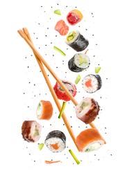 Image of Sushi rolls and wooden chopsticks flying on white background
