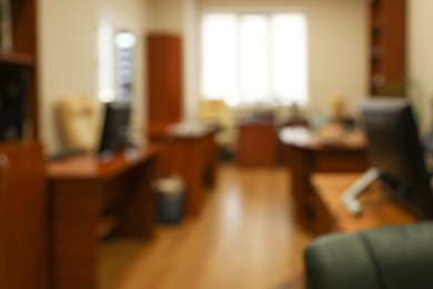 Photo of Blurred view of modern office interior. Bokeh effect