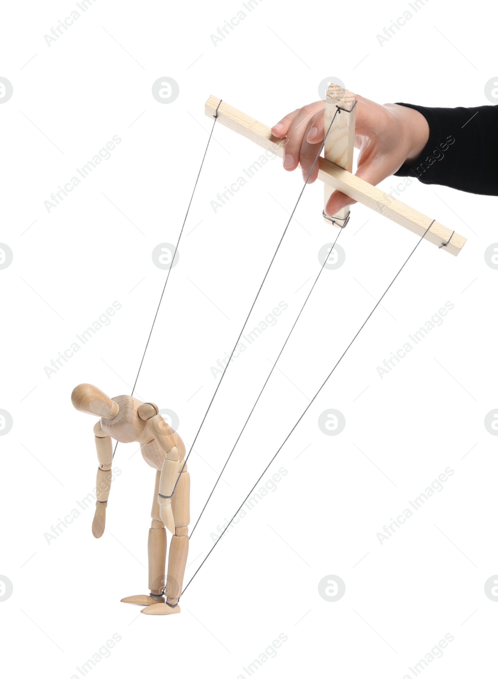 Photo of Woman pulling strings of puppet on white background, closeup