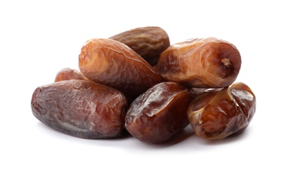 Photo of Sweet dates on white background. Dried fruit as healthy snack