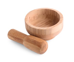 Photo of Wooden mortar and pestle on white background