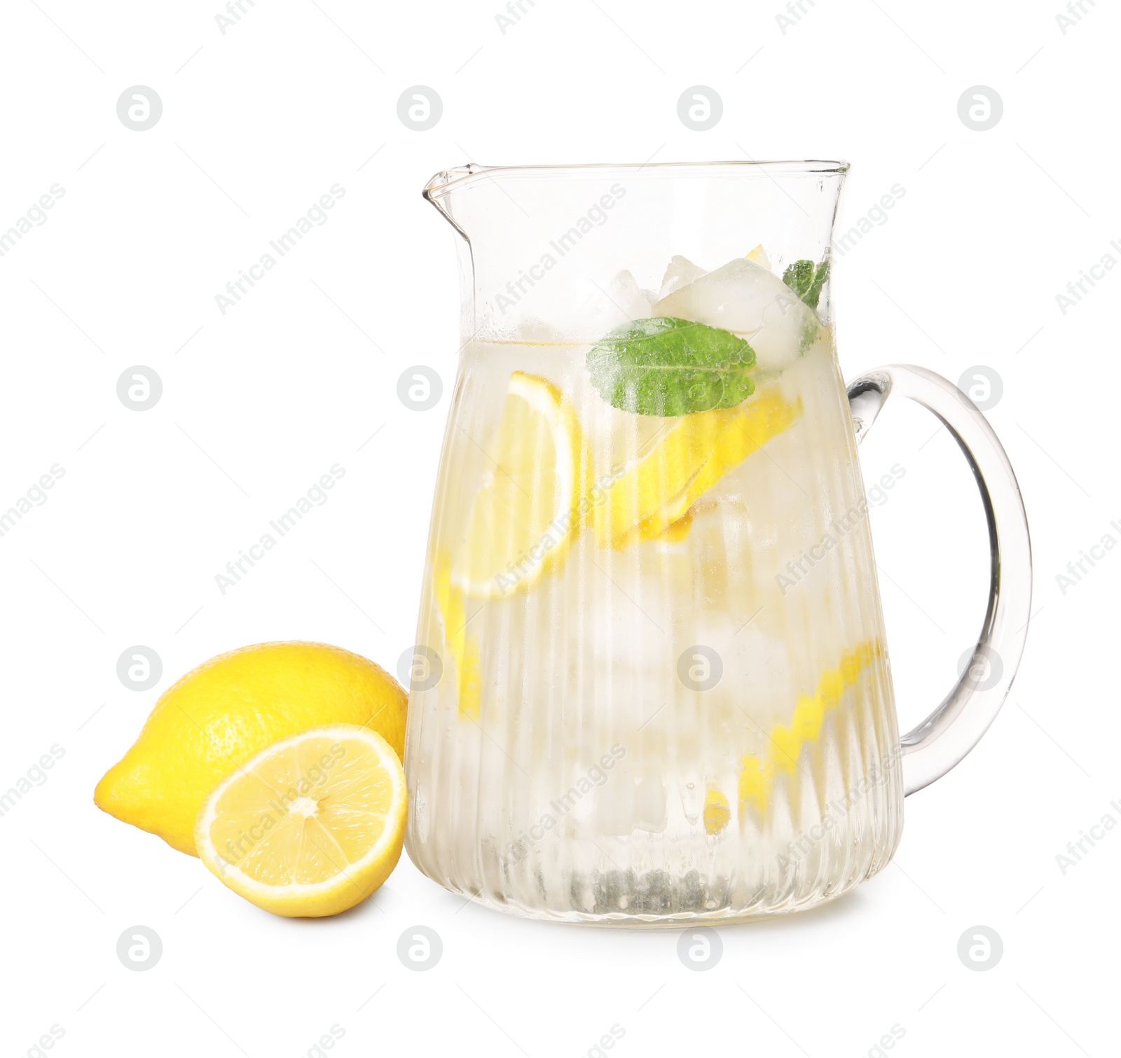 Photo of Freshly made lemonade in jug isolated on white