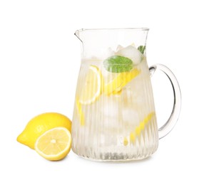 Photo of Freshly made lemonade in jug isolated on white