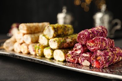 Turkish delight dessert on dark table. Traditional sweet