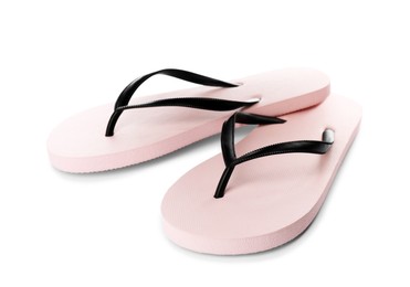 Stylish pink flip flops on white background. Beach object