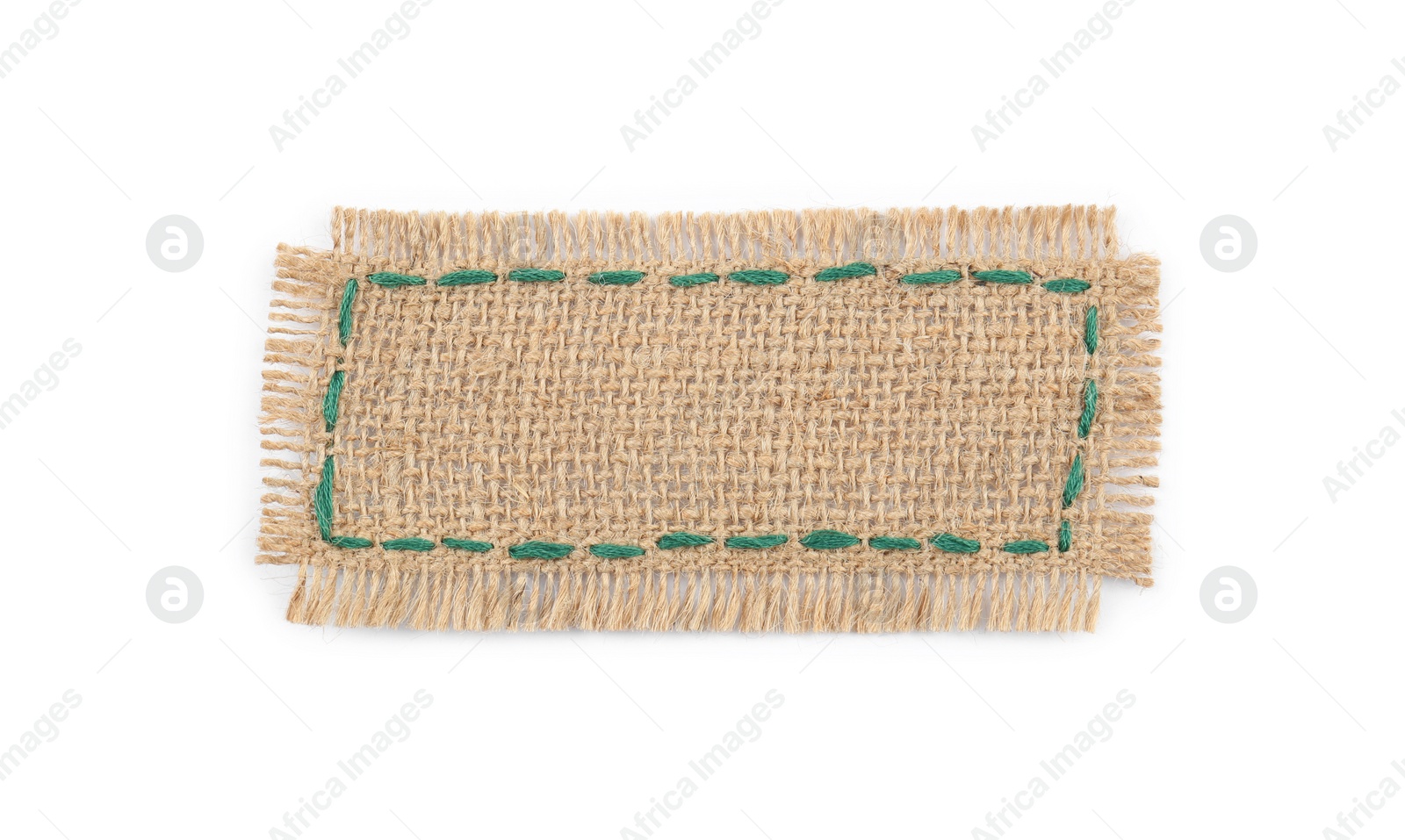 Photo of Piece of burlap fabric with green stitches isolated on white, top view